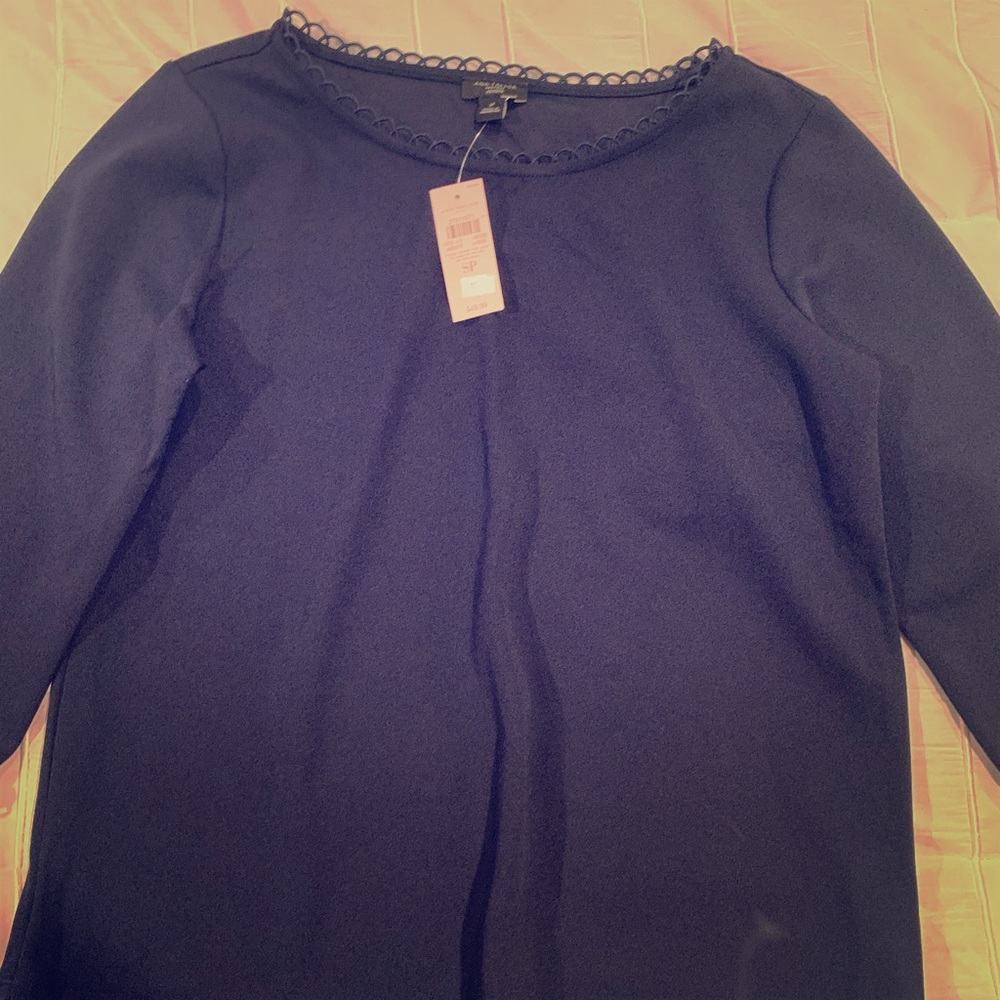 Ann Taylor navy blue blouse.